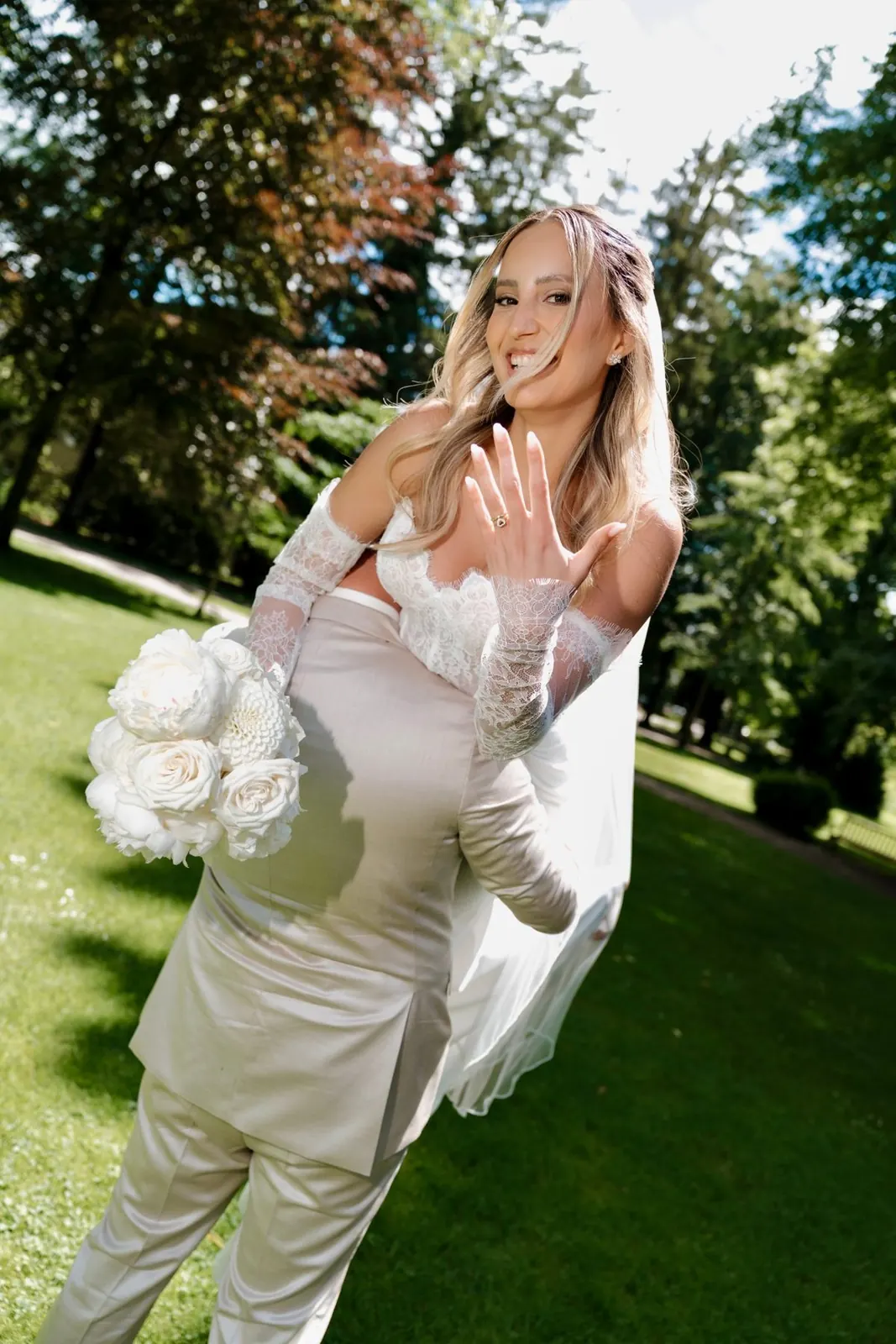 Bride showing her ring in a German park