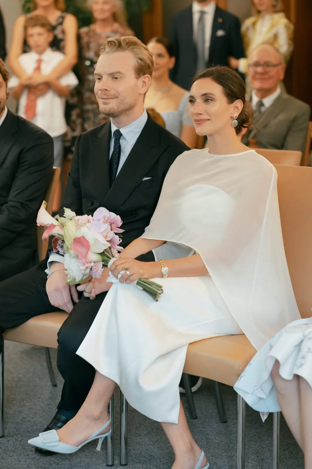 Bride and groom seated at their civil wedding ceremony
